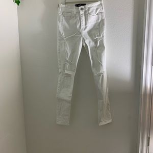 Hollister white jeans. Lightly distressed. High rise super skinny. Stretch.